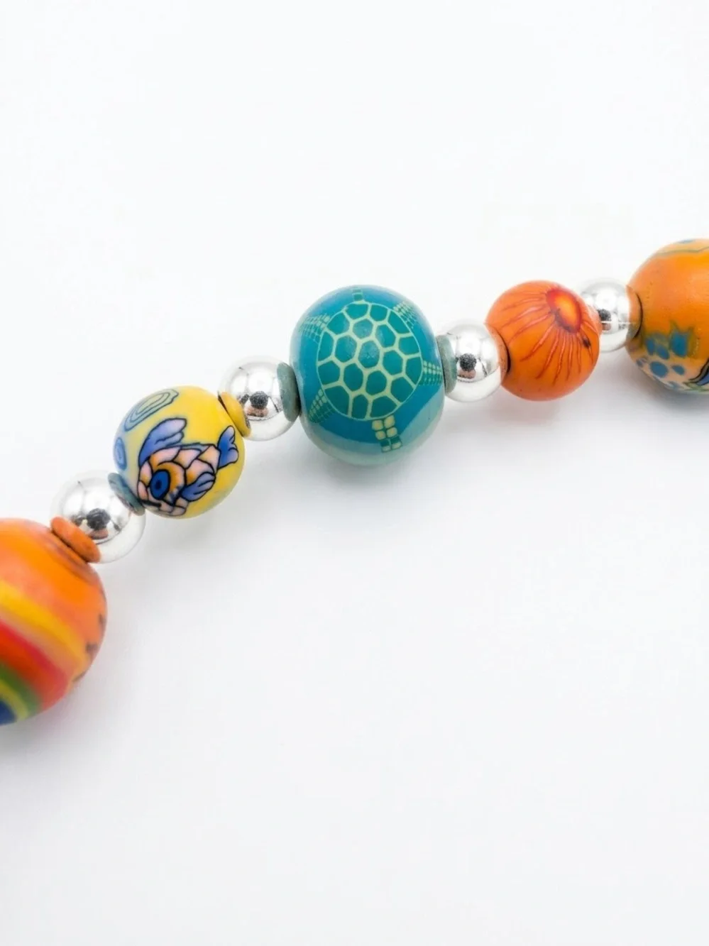 Viva clay bead phone case charm. With ocean wildlife.